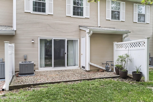 21 Steeple Chase Ct, Tinton Falls, NJ 07724 - rear view of property featuring central AC