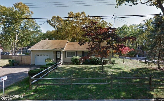 view of front of home with an attached garage and driveway