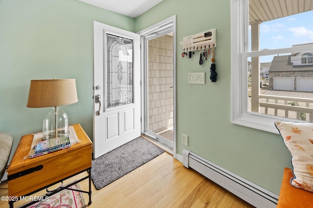 44 Cabana Dr, Brick, NJ 08723 - entrance foyer featuring baseboard heating, wood finished floors, and baseboards