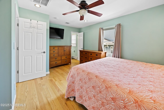 44 Cabana Dr, Brick, NJ 08723 - bedroom with light wood-style flooring, a baseboard heating unit, recessed lighting, and a ceiling fan