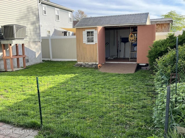 44 Cabana Dr, Brick, NJ 08723 - view of yard with a storage shed, central air condition unit, and an outbuilding