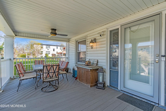 wooden terrace with ceiling fan
