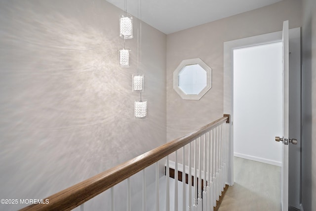 staircase with wood finished floors
