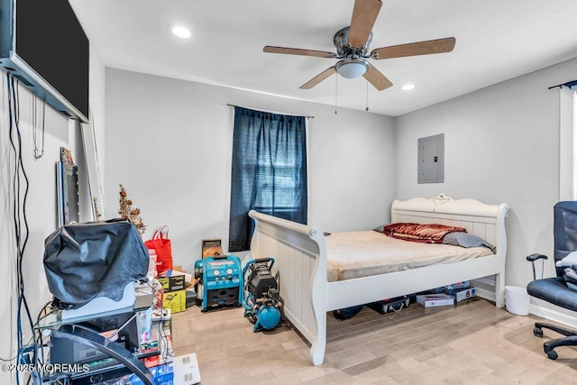 243 6th Ave, Long Branch, NJ 07740 - bedroom with electric panel, wood finished floors, recessed lighting, and ceiling fan