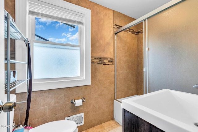 243 6th Ave, Long Branch, NJ 07740 - full bath with a sink, tiled shower, toilet, and tile patterned floors