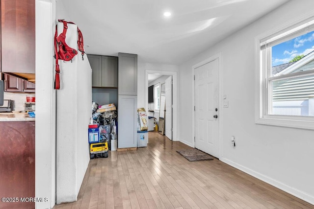 243 6th Ave, Long Branch, NJ 07740 - foyer with light wood-style floors and baseboards