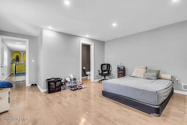 243 6th Ave, Long Branch, NJ 07740 - bedroom with recessed lighting, baseboards, wood finished floors, and ensuite bathroom