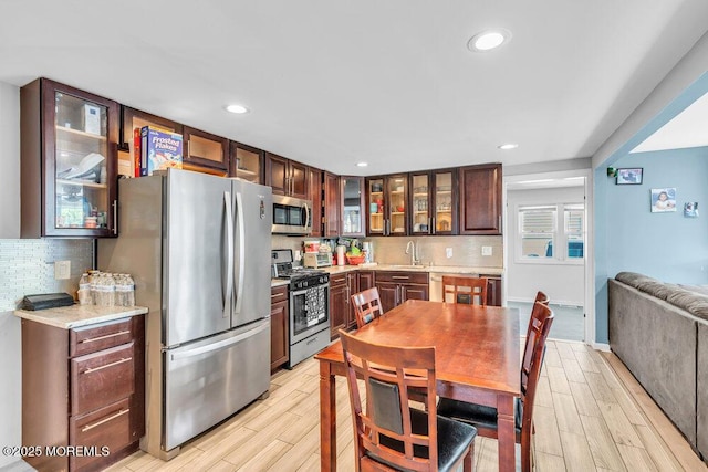 243 6th Ave, Long Branch, NJ 07740 - kitchen with stainless steel appliances, light wood-type flooring, light countertops, and recessed lighting