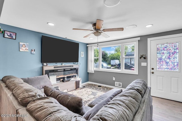 243 6th Ave, Long Branch, NJ 07740 - living area with ceiling fan, recessed lighting, wood finished floors, and baseboards