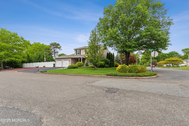 251 Worth St, Brick, NJ 08724 - view of front of house featuring asphalt driveway and an attached garage