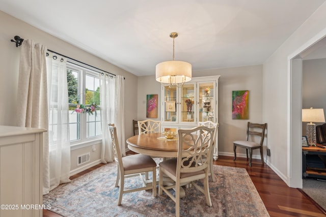 251 Worth St, Brick, NJ 08724 - dining room featuring wood finished floors and baseboards