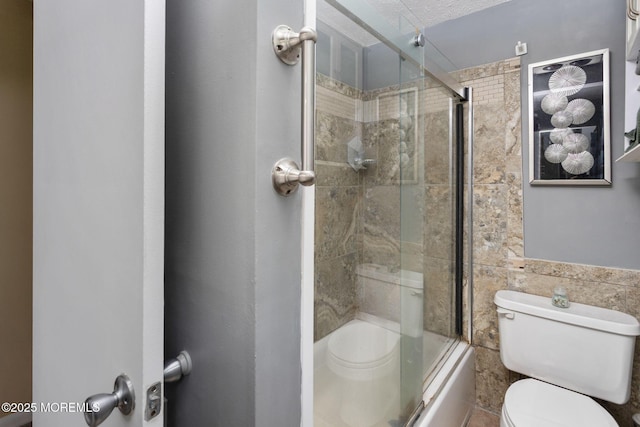 19 Kenyon Dr, Plumsted, NJ 08533 - full bathroom with toilet, shower / bath combination with glass door, and tile walls