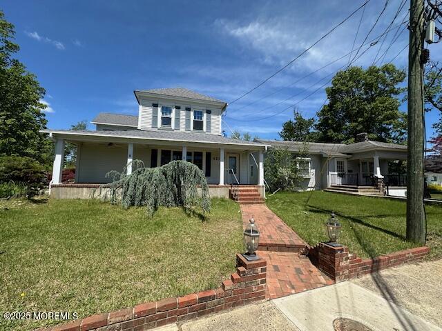 421 W Lincoln Ave, Oakhurst, NJ 07755 - farmhouse inspired home with covered porch and a front yard