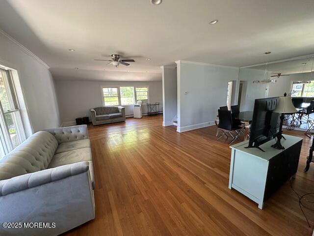 421 W Lincoln Ave, Oakhurst, NJ 07755 - living area featuring a ceiling fan, healthy amount of natural light, ornamental molding, wood finished floors, and recessed lighting