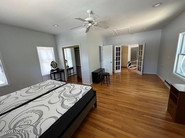 421 W Lincoln Ave, Oakhurst, NJ 07755 - bedroom with attic access, wood finished floors, a baseboard radiator, recessed lighting, and ceiling fan