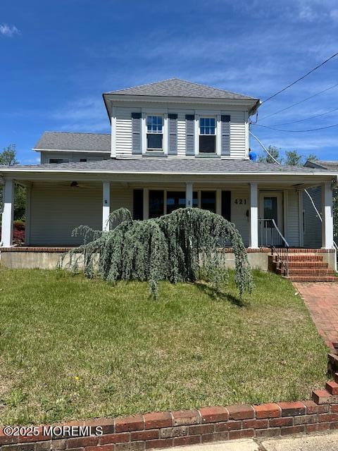 421 W Lincoln Ave, Oakhurst, NJ 07755 - farmhouse inspired home featuring a porch, a front lawn, and roof with shingles