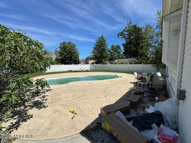 421 W Lincoln Ave, Oakhurst, NJ 07755 - view of swimming pool with a fenced backyard and a patio area