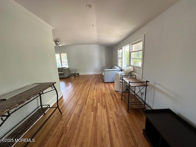 421 W Lincoln Ave, Oakhurst, NJ 07755 - sitting room with wood finished floors, healthy amount of natural light, baseboards, and vaulted ceiling
