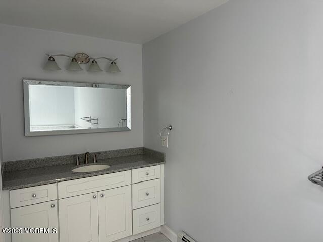 421 W Lincoln Ave, Oakhurst, NJ 07755 - bathroom featuring vanity and baseboards