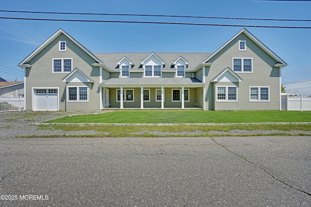 view of front of property with an attached garage, covered porch, and driveway
