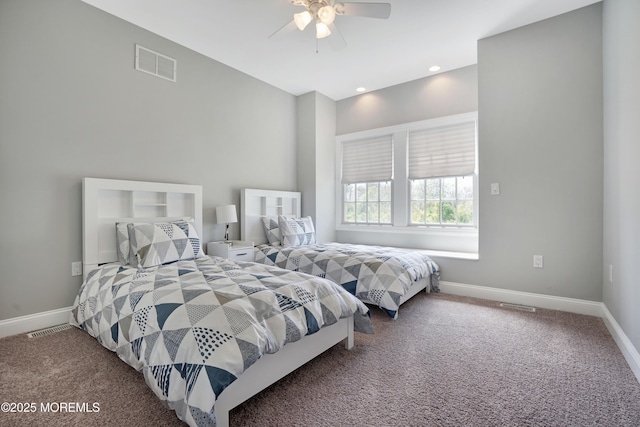 bedroom featuring carpet flooring, baseboards, and a ceiling fan