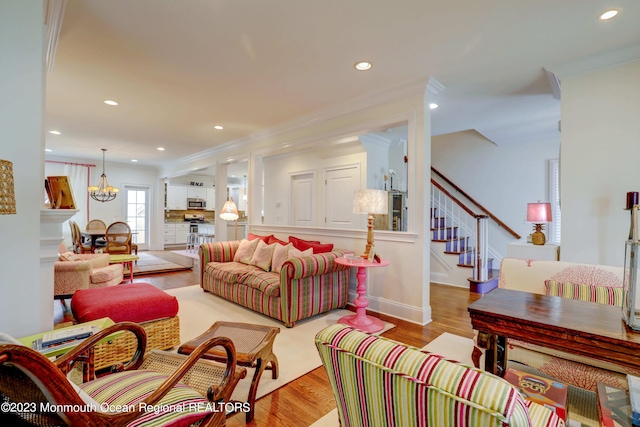 35 Embury Ave, Ocean Grove, NJ 07756 - living area with stairs, wood finished floors, recessed lighting, ornamental molding, and baseboards