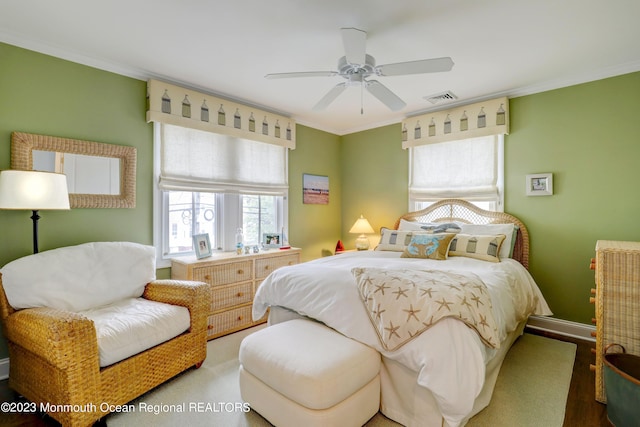 35 Embury Ave, Ocean Grove, NJ 07756 - bedroom with crown molding, wood finished floors, a ceiling fan, and baseboards
