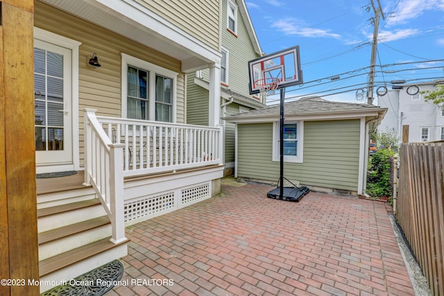 35 Embury Ave, Ocean Grove, NJ 07756 - view of patio with a porch, fence, and an outdoor structure