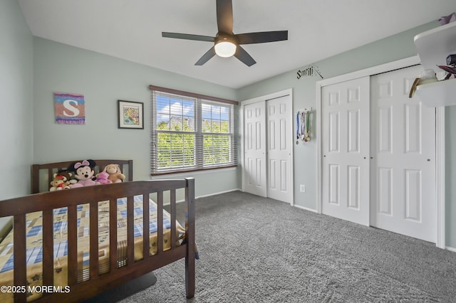 23 Woodpecker Way, Marlboro, NJ 07746 - bedroom with multiple closets, carpet, and a ceiling fan