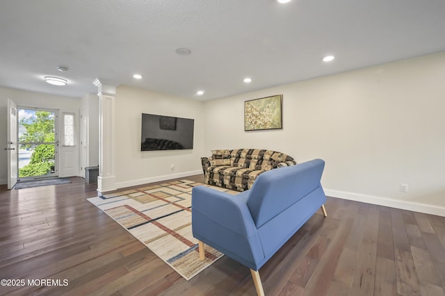 23 Woodpecker Way, Marlboro, NJ 07746 - living area with ornate columns, wood finished floors, and recessed lighting