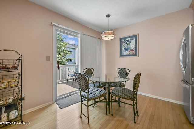 23 Woodpecker Way, Marlboro, NJ 07746 - dining space featuring light wood finished floors