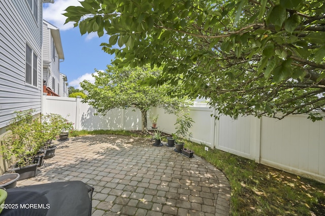 23 Woodpecker Way, Marlboro, NJ 07746 - fenced backyard featuring a patio area