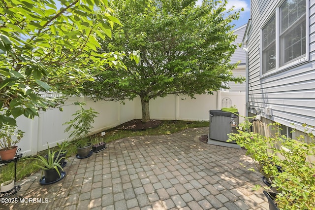 23 Woodpecker Way, Marlboro, NJ 07746 - fenced backyard featuring a patio area