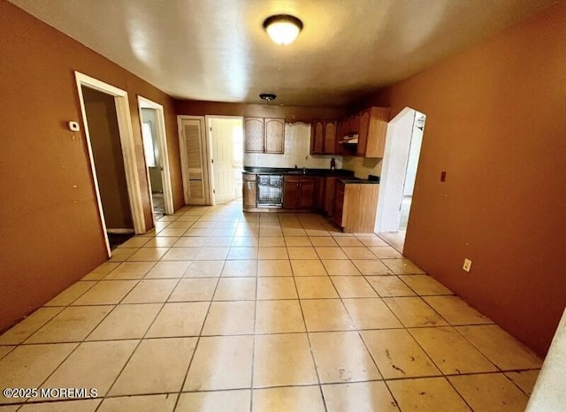 80 Seeley Ave, Keansburg, NJ 07734 - kitchen with dark countertops, light tile patterned floors, range hood, and wine cooler