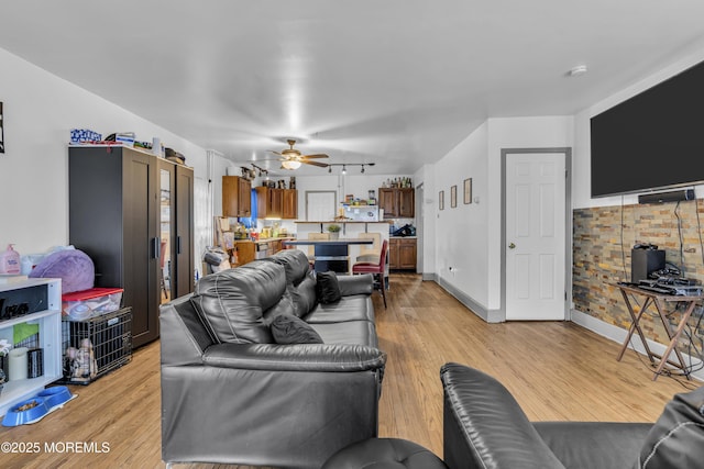 23 Vought Ave, Freehold, NJ 07728 - living room featuring ceiling fan, light wood-style floors, and baseboards