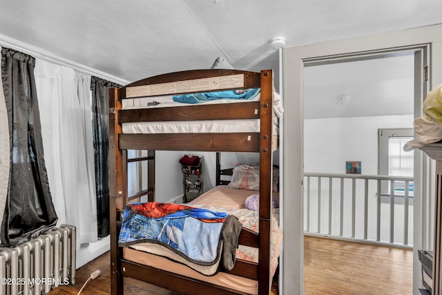 23 Vought Ave, Freehold, NJ 07728 - bedroom featuring radiator and wood finished floors