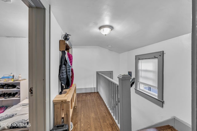23 Vought Ave, Freehold, NJ 07728 - hall with an upstairs landing, vaulted ceiling, and wood finished floors