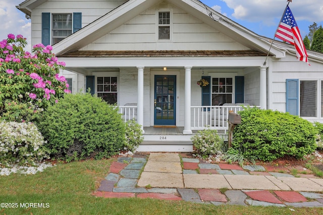 doorway to property with covered porch