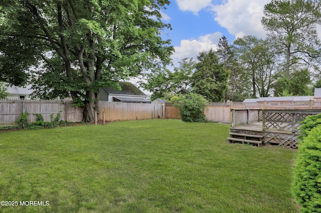 view of yard featuring a deck