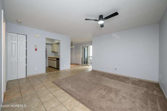 270 Main St Unit 6, Keansburg, NJ 07734 - unfurnished room with ceiling fan, light tile patterned floors, a smoke detector, and baseboards