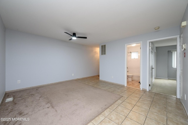 270 Main St Unit 6, Keansburg, NJ 07734 - empty room with ceiling fan, light tile patterned floors, a smoke detector, and baseboards