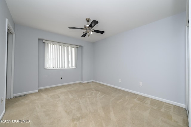 270 Main St Unit 6, Keansburg, NJ 07734 - spare room with light carpet, baseboards, and ceiling fan