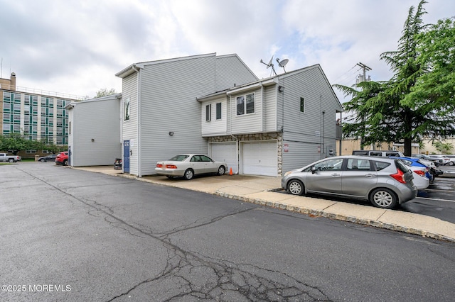 270 Main St Unit 6, Keansburg, NJ 07734 - view of front of home with a garage