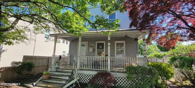 399 Willow Ave, Long Branch, NJ 07740 - view of front of house with a porch and fence