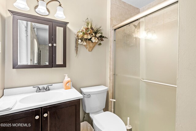 63 Lauren Ln N, Brick, NJ 08723 - bathroom with a shower stall, toilet, and vanity