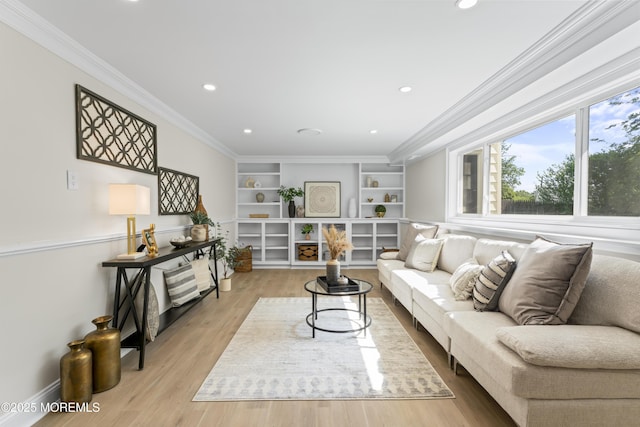 living room featuring crown molding, recessed lighting, light wood-type flooring, built in shelves, and baseboards