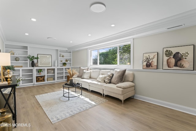 living room featuring crown molding, wood finished floors, recessed lighting, and baseboards