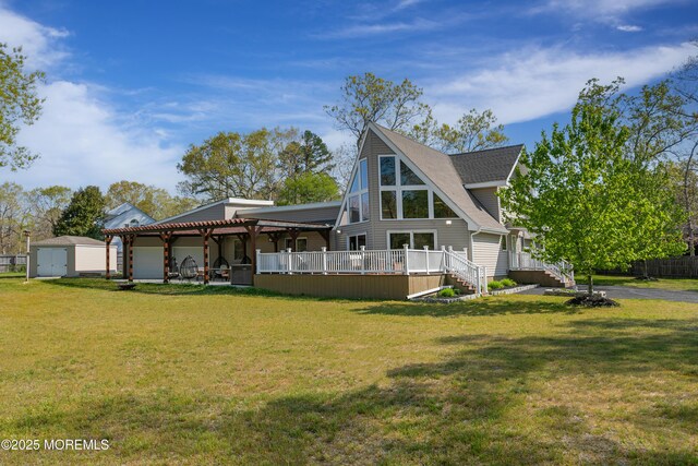 328 E Pleasant Grove Rd, Jackson, NJ 08527 - back of house featuring an outbuilding, a yard, a storage shed, and a deck