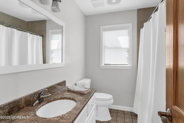 328 E Pleasant Grove Rd, Jackson, NJ 08527 - bathroom with tile patterned flooring, vanity, toilet, curtained shower, and baseboards