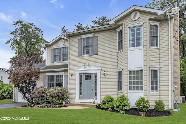 2124 3rd Ave, Toms River, NJ 08757 - view of front of property with a front lawn, a garage, cooling unit, and driveway